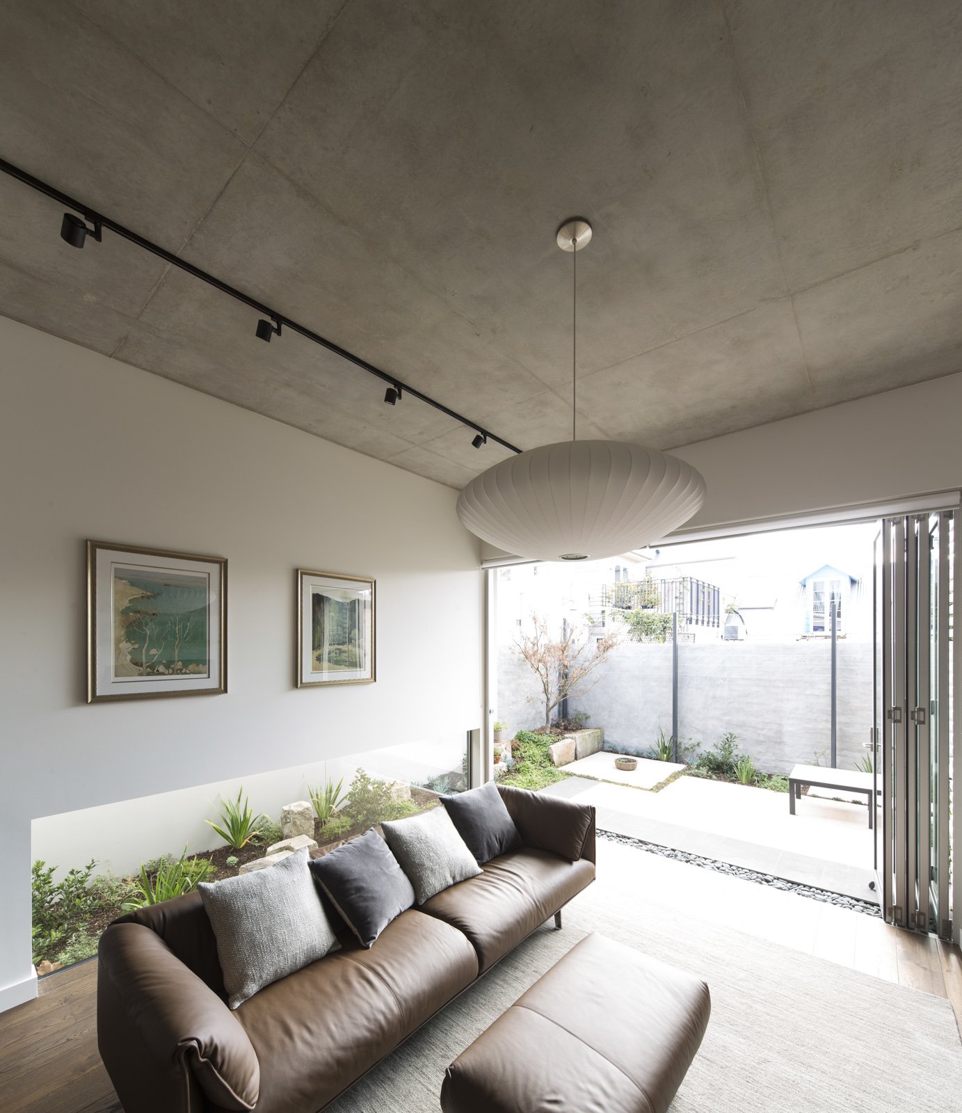 混凝土雨篷:悉尼遗产联排屋改造