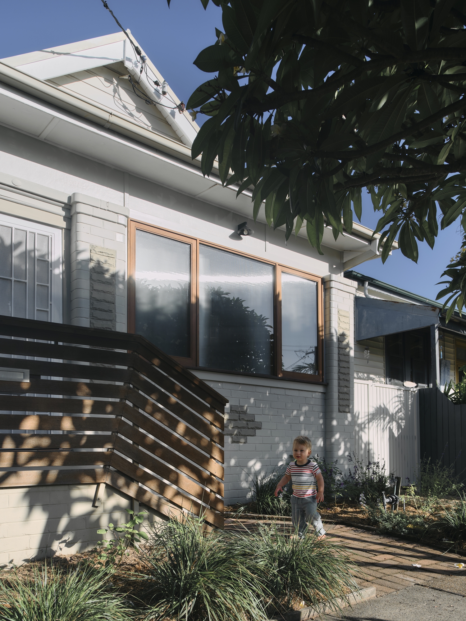 Ellis' Place: A New Family Home Added to an Old House
