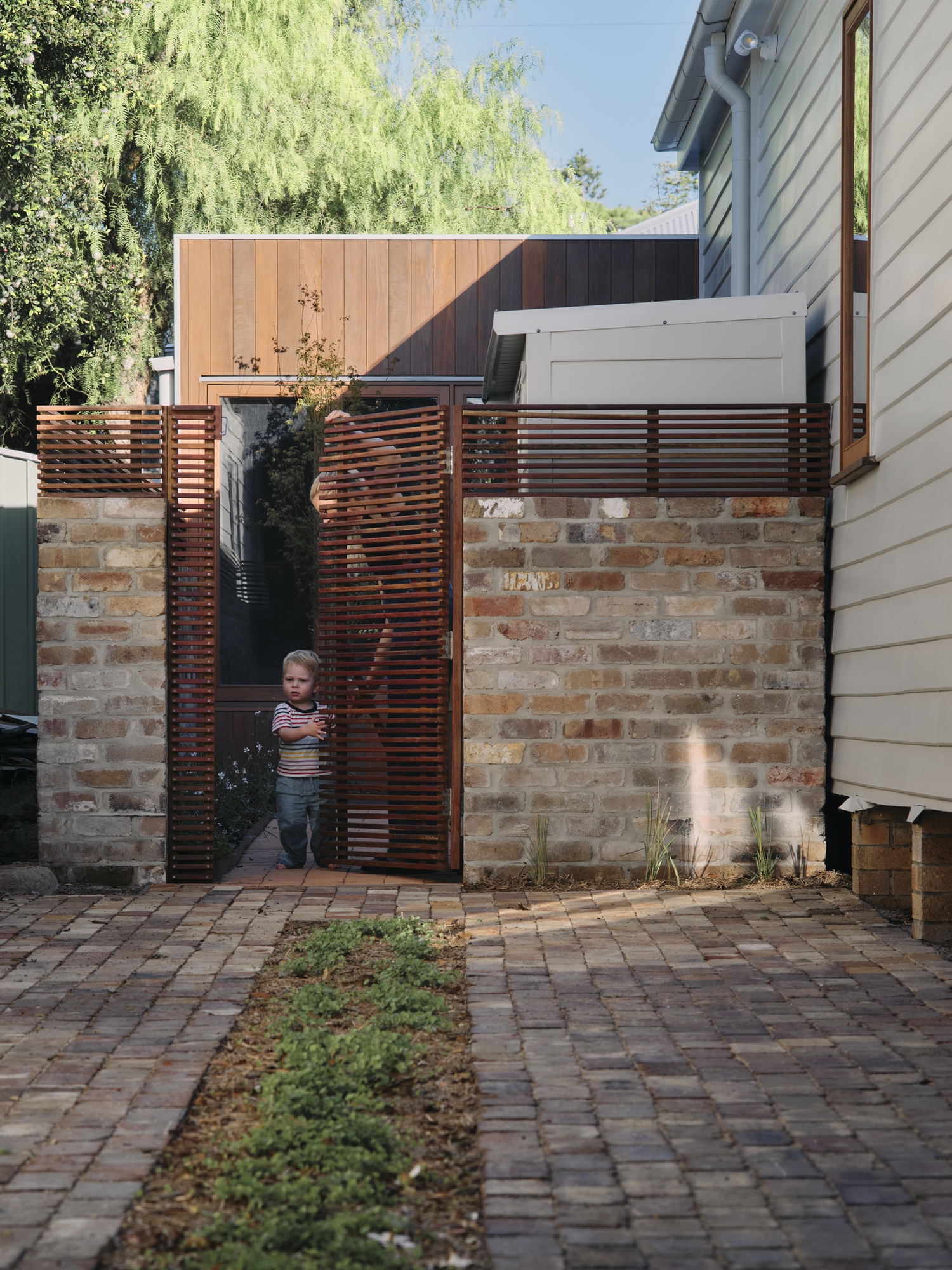 Ellis' Place: A New Family Home Added to an Old House