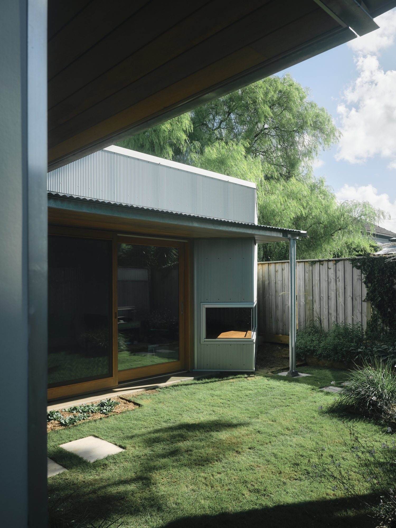 Ellis' Place: A New Family Home Added to an Old House