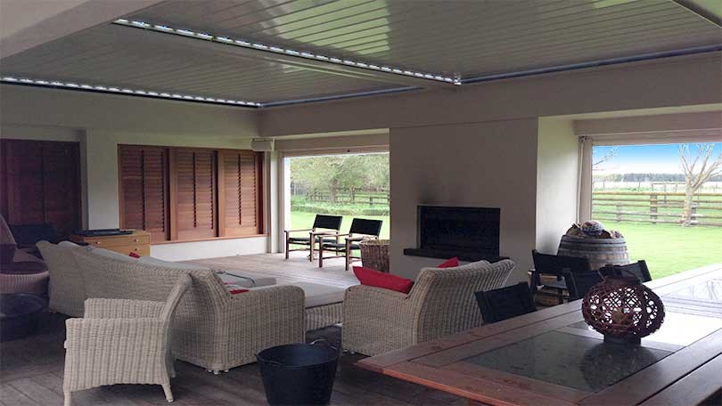 Outdoor entertainment area addition to 1960s Hastings residence