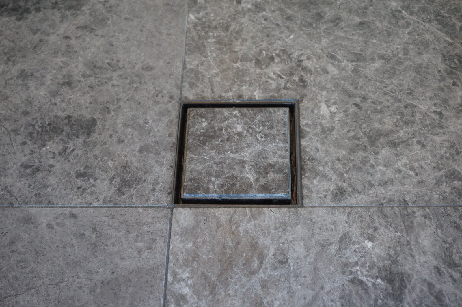 Home Bathroom Tile Renovation with Round Bathtub as Focal Point
