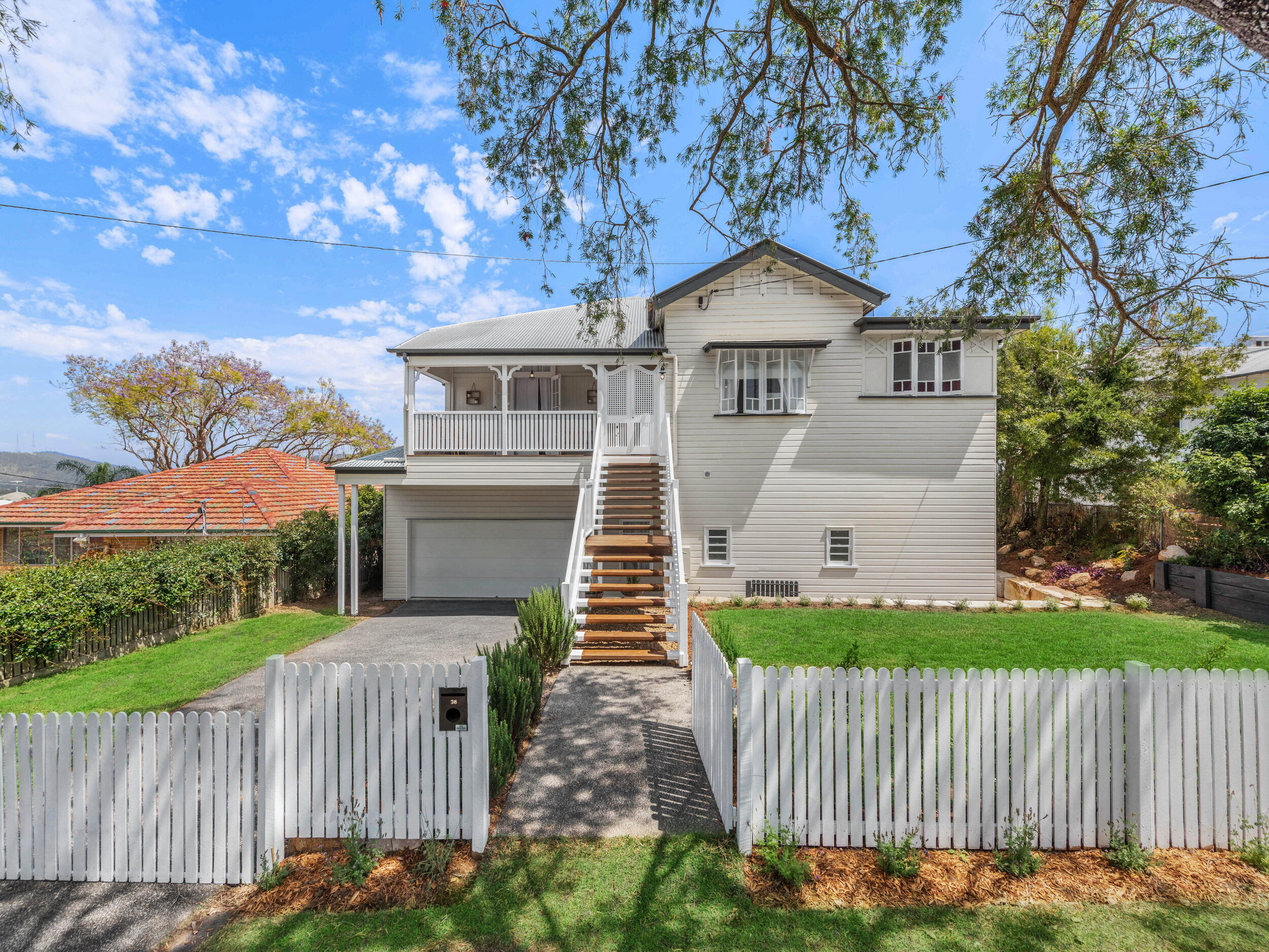 تجديد وتوسيع منزل من طراز Queenslander عمره قرن في Alderley
