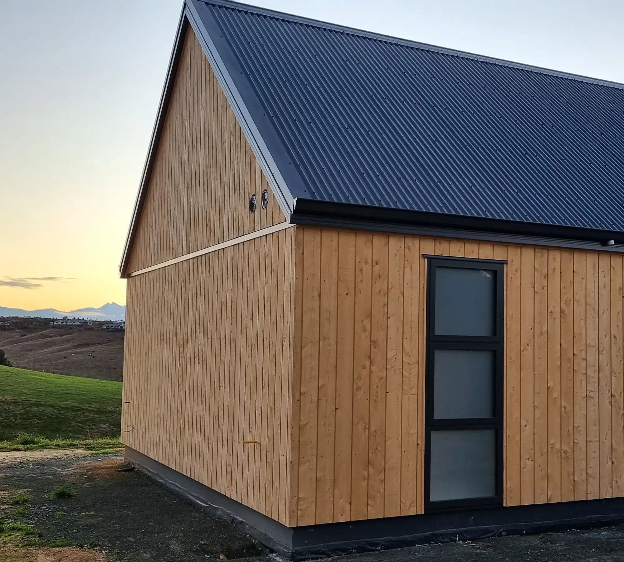 Redwood Valley Cypress Cladding and Oxidised Concrete Floor Residence