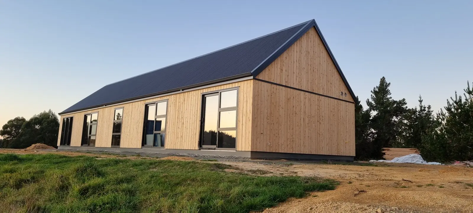 Redwood Valley Cypress Cladding and Oxidised Concrete Floor Residence